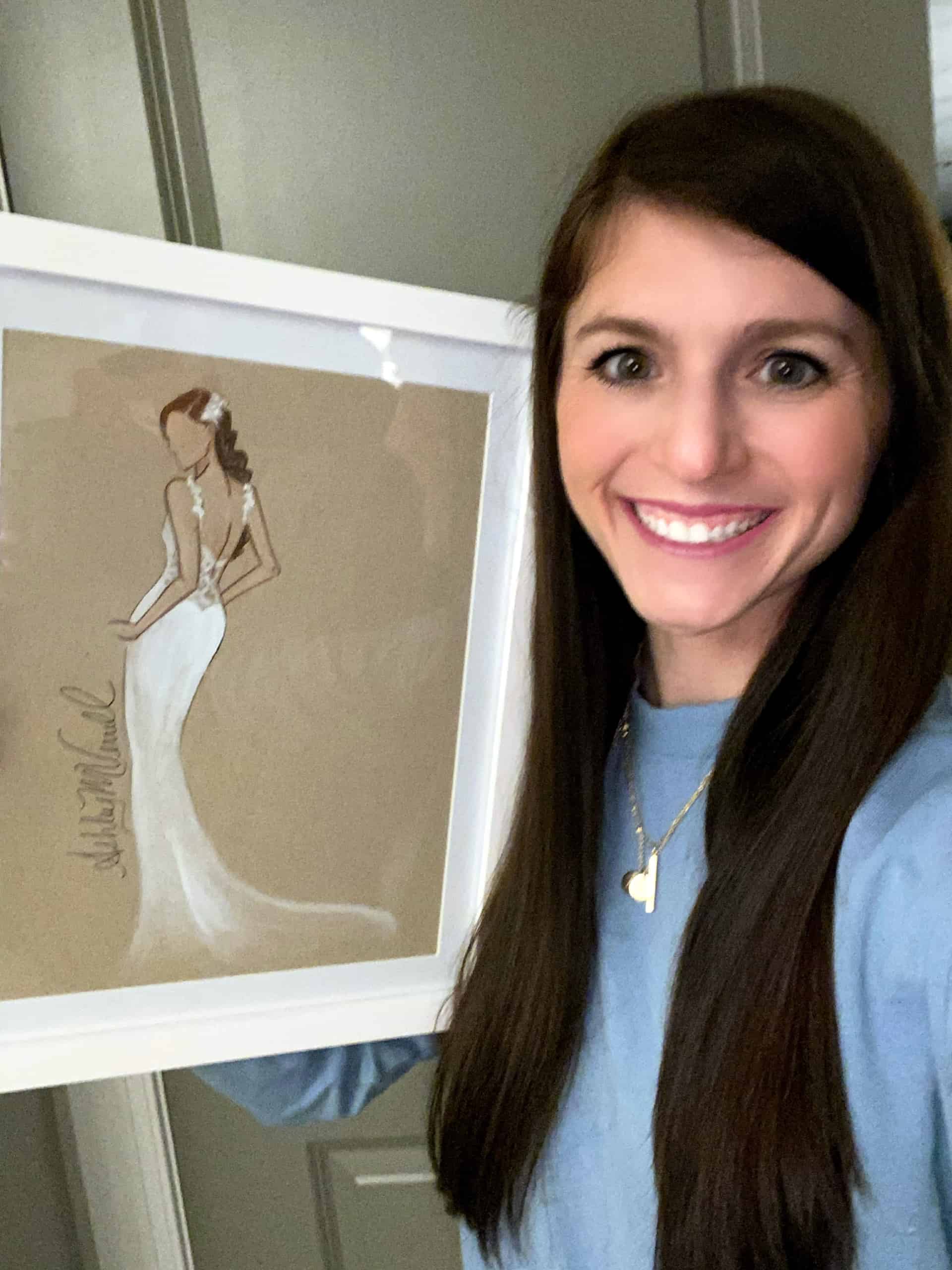 Bride Holding Wedding Gift of Wedding Dress Artwork