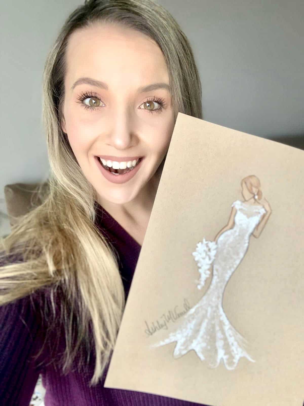 Bride Holding Bridal Illustration Purchased for Her as Gift